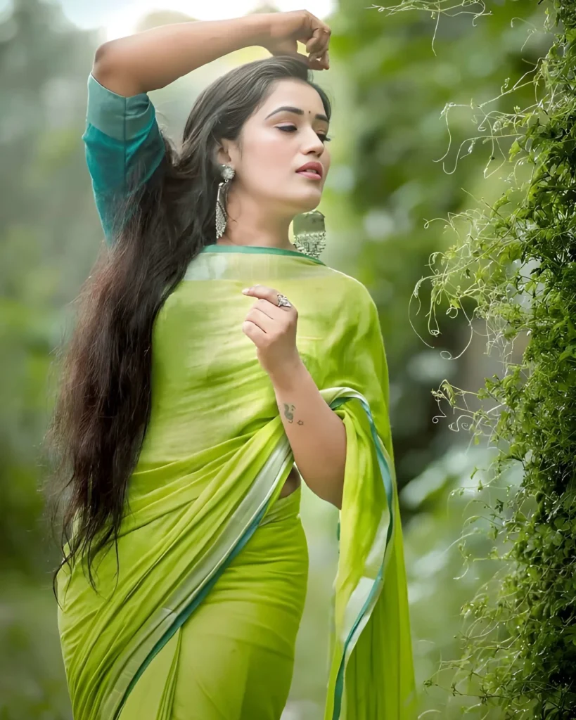 Anumol RS in green saree